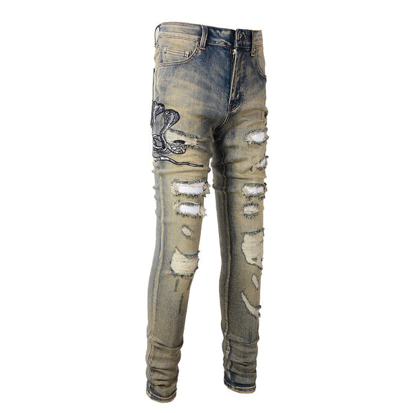 Jeans Slim Fit Desgastados con Bordado de Serpiente de Tres Cabezas y Parches de Cuero