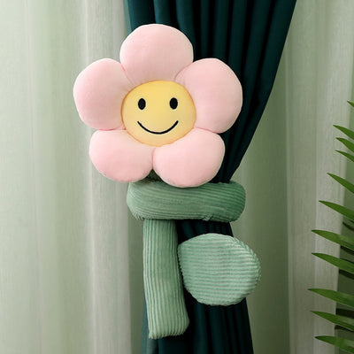 Plush white sunflower curtain buckle with a yellow smiley face center and green stem, holding back a dark green curtain. - Image 14