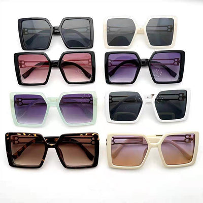 Women's large frame square sunglasses with black plastic frames, purple gradient lenses, and gold-tone metal temples. - Image 10