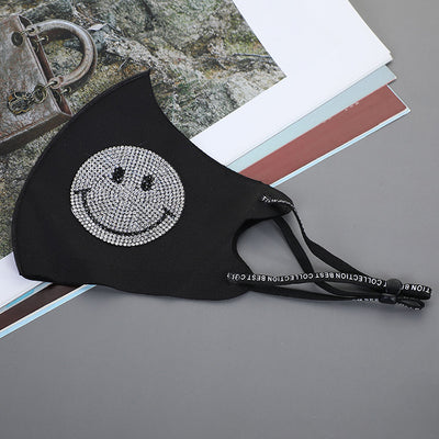 Black ear-mounted mask with a sparkling rhinestone bow pattern, featuring adjustable ear loops. - Image 8