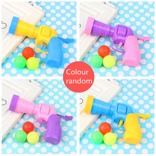 Colorful pompom balls and a yellow and blue toy launcher, a fun set for cats or kids. - Image 9