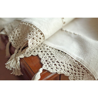 Beige cotton linen cafe curtain with tab tops, snowflake embroidery, and brown crochet trim with tassels. - Image 5