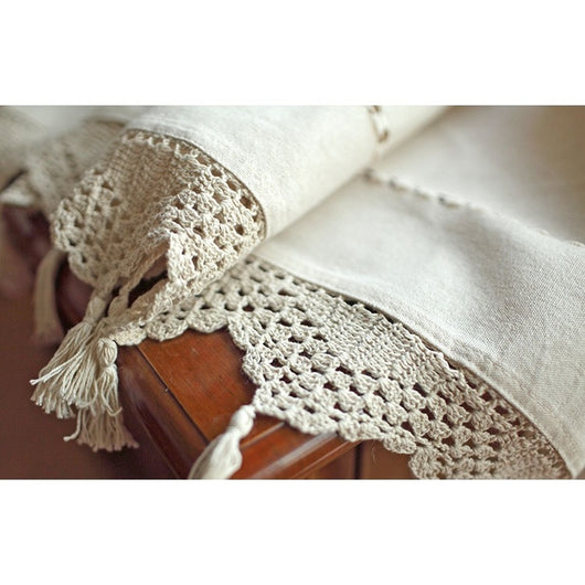 Beige cotton linen cafe curtain with tab tops, snowflake embroidery, and brown crochet trim with tassels. - Image 5
