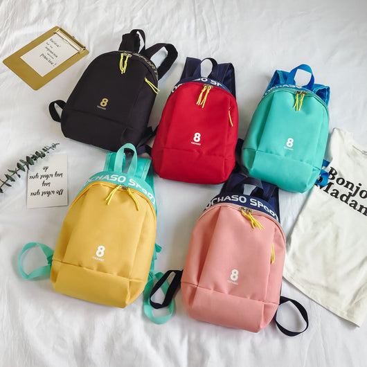 Light blue children's backpack with "TOCHASO SPORTS" text, a number 8, and yellow zipper pulls. - Image 14
