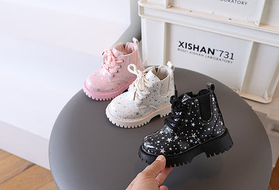 White toddler girls' boots with a holographic star pattern, lace-up front, and side zipper closure. - Image 26