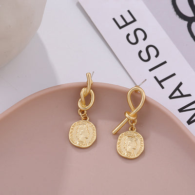 Aretes Irregulares Rostro Abstracto con Acabado Mate