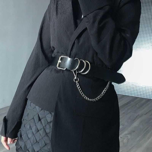 Black waist belt with single shoulder strap, silver buckle, D-rings, and decorative chain.
