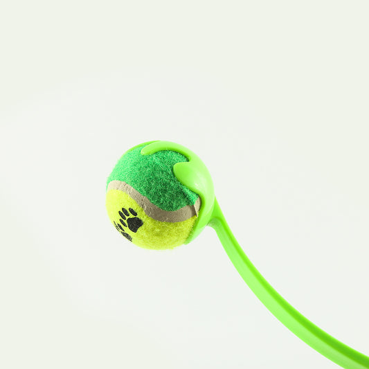 Pink pet throwing cue with a yellow and orange tennis ball, designed for outdoor dog training and play. - Image 2