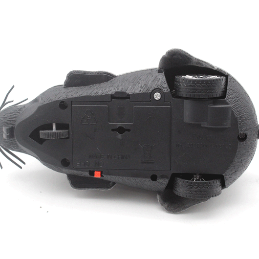 Black remote control mouse toy with a flocking texture and a black remote control on a white background. - Image 9