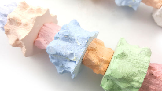 Colorful pepper stone molar string toy for birds, featuring pastel blocks and a metal bell at the bottom. - Image 3