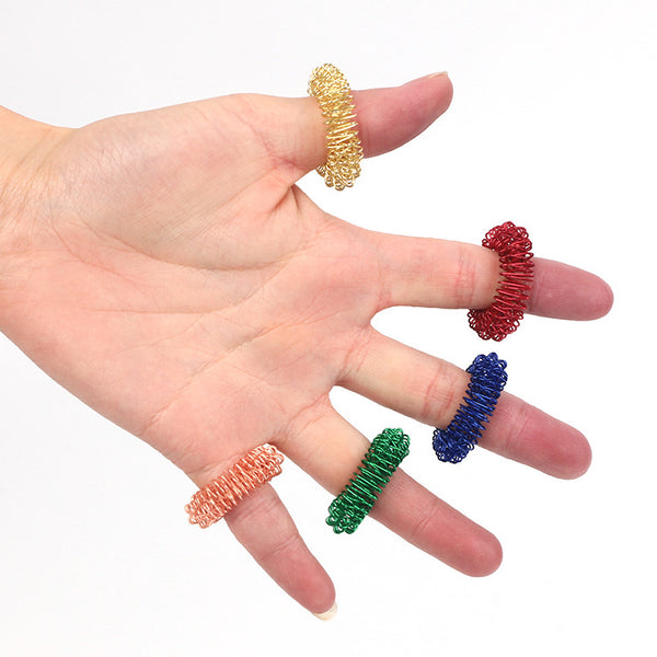 Anillo Masajeador de Dedos con Resorte - Masaje Acupresión Portátil