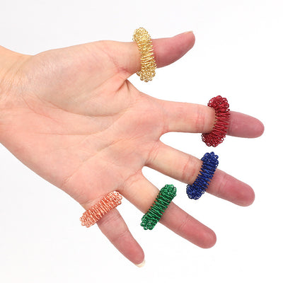 Anillo Masajeador de Dedos con Resorte - Masaje Acupresión Portátil