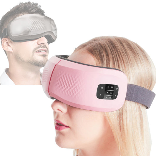 Man wearing a gray full automatic wireless eye massager with a textured geometric pattern on a white background. - Image 8