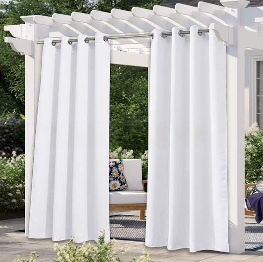 Solid gray outdoor curtain panels with grommet tops hanging from a white pergola on a sunny patio. - Image 12