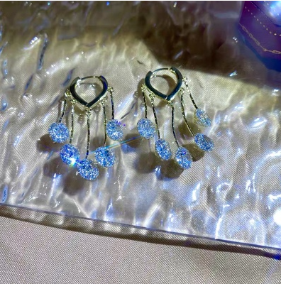 Aretes de Lujo Minimalista con Borlas en Tono Durazno - Image 6