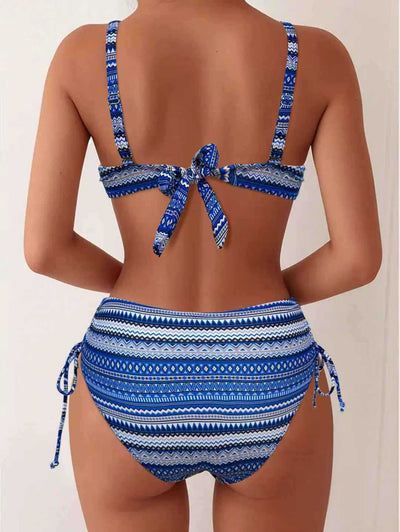 Blue, white, and black geometric print bikini with spaghetti strap bandeau top and high-waisted side-tie bottoms. - Image 22