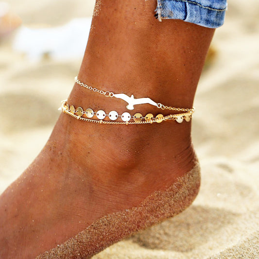 Pulsera de Tobillo Multicapa con Cadena de Discos y Pájaros Voladores