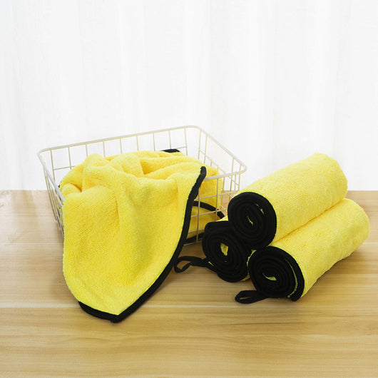 Yellow microfiber pet drying towel with black trim draped over a bathtub, with a golden retriever, poodle, and cat. - Image 10