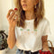 Playera Corta para Mujer con Ilustración Cute de Letras Coco