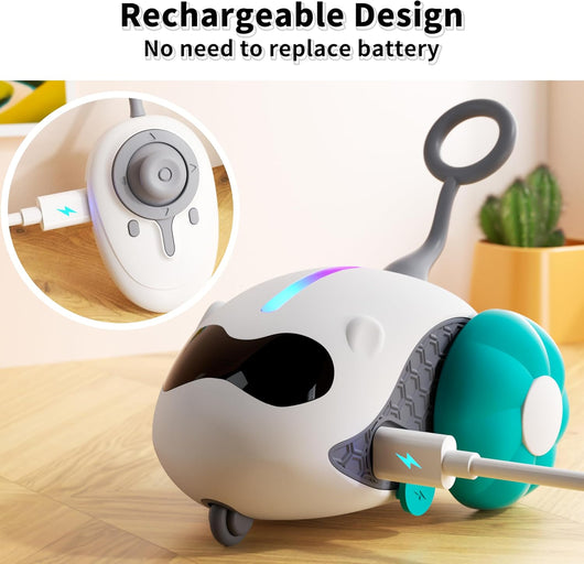 Interactive cat toy with white robotic base, orange wheels, and feather attachment, controlled by a remote, with a cat looking on. - Image 12