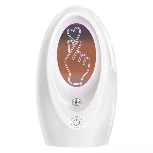 Navy blue USB humidifier with an oval shape and an illuminated castle design in the center. - Image 5