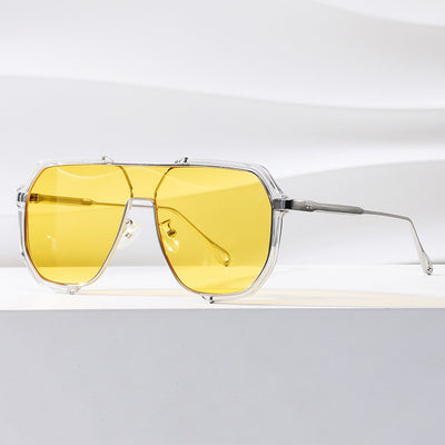 Black and gold polygon sunglasses with dark gray lenses, featuring a trendy concave design and anti-blue light properties.