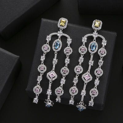 Aretes Largos de Cobre con Circonita Geométrica y Borla para Mujer - Image 7