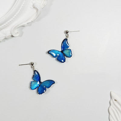 Hilo de Oreja Mariposa Azul en Plata de Ley S925 con Perla Larga - Image 2