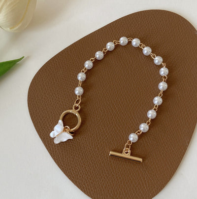 Pulsera de Perla con Dije Mariposa Hada - Elegancia Femenina - Image 3