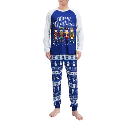 Blue and white long-sleeve Christmas pajama set with "Merry Christmas" text, nutcracker soldiers, and snowflake patterns.