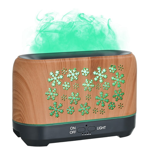 Wood grain humidifier with snowflake pattern, emitting blue flame-like mist, shown with remote control and other color options. - Image 10