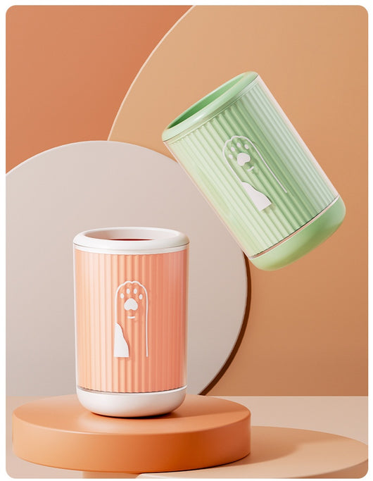 Light blue pet foot washing cup with a white paw print design, ribbed texture, and smooth base. - Image 32