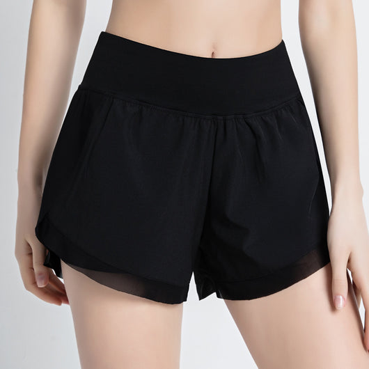 Pantalones Deportivos Holgados Dos Capas Anticarrera - Image 11