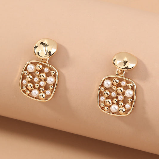 Aretes de Perla con Corte Cuadrado