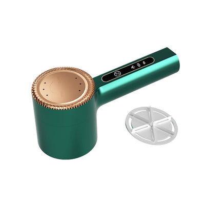 White electric lint remover with a perforated metal screen and a brown textured accent band. - Image 2
