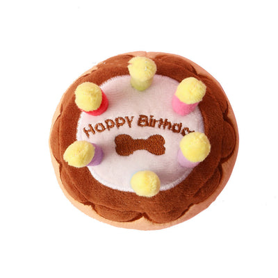 Plush pet birthday cake toy with colorful candles, featuring brown cake layers and white frosting. - Image 2