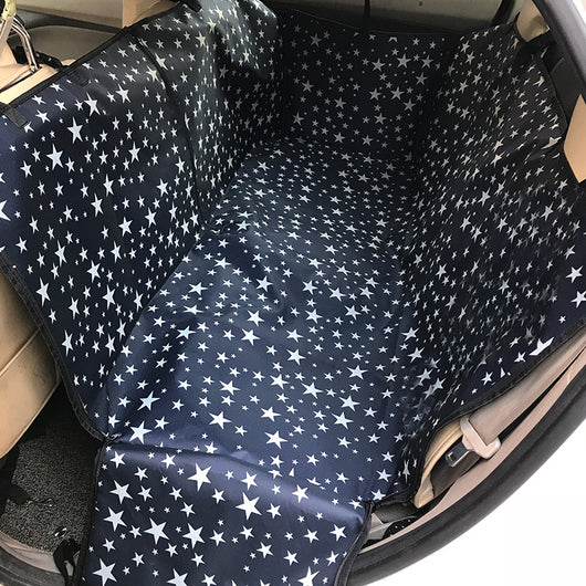Dark blue car pet seat cover with white star pattern installed in a vehicle's back seat. - Image 9