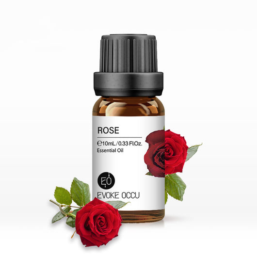 Rose essential oil in a brown glass bottle with a black cap, labeled 'ROSE Essential Oil e30mL / 1.01Fl.Oz'.