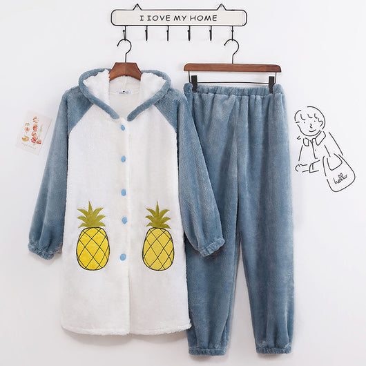 Cream and yellow thick flannel hooded pajama set with pineapple appliques, worn by a person sitting indoors. - Image 11