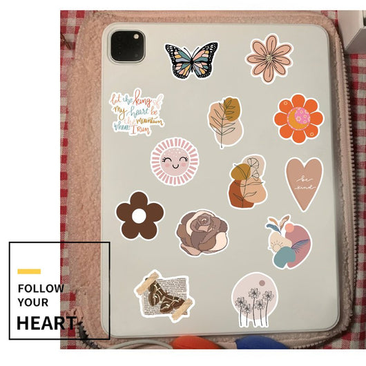 A large collection of bohemian-style stickers featuring rainbows, flowers, animals, and inspirational quotes like "be a kind human" and "choose happy." - Image 12