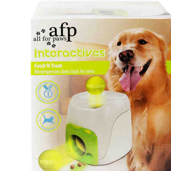 AFP Fetch'N Treat interactive dog toy, a white and green machine that dispenses treats with a tennis ball.