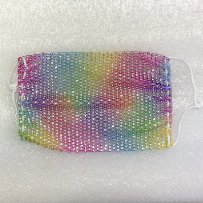 Close-up of a blue mesh fabric adorned with numerous small, clear rhinestones, creating a sparkling texture. - Image 65
