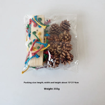 Packaged parrot toy with a wooden block, colorful hemp ropes, and natural pine cones for chewing and play. - Image 6