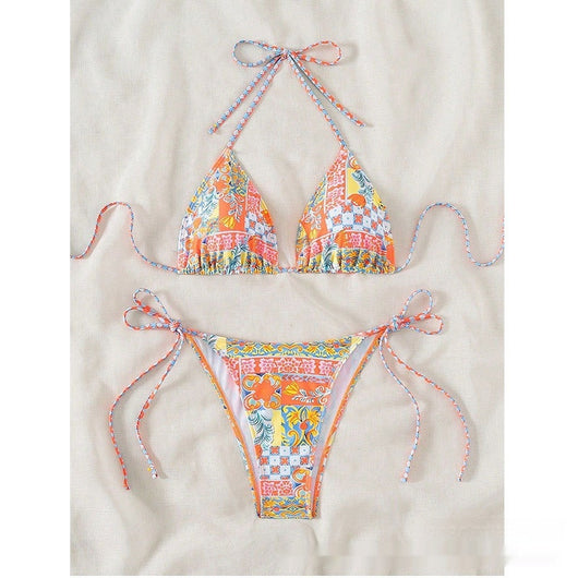 Female creative minimally printed split bikini set with a vibrant bohemian pattern and tie-side bottoms. - Image 6