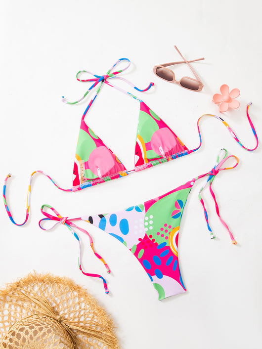Women's vibrant abstract eye print bikini with triangle top and tie-side bottoms, featuring pink, green, and blue. - Image 7