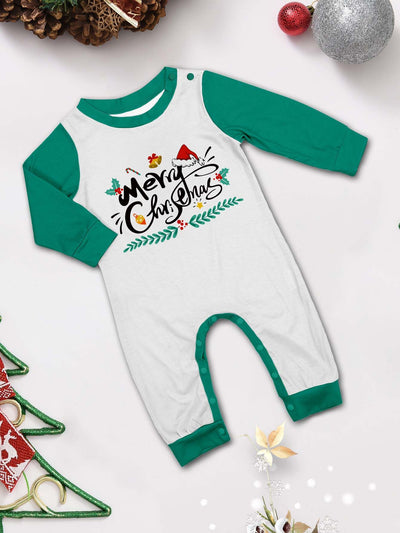 Family of four wearing matching green and white striped Christmas pajamas with "Merry Christmas" graphic. - Image 18