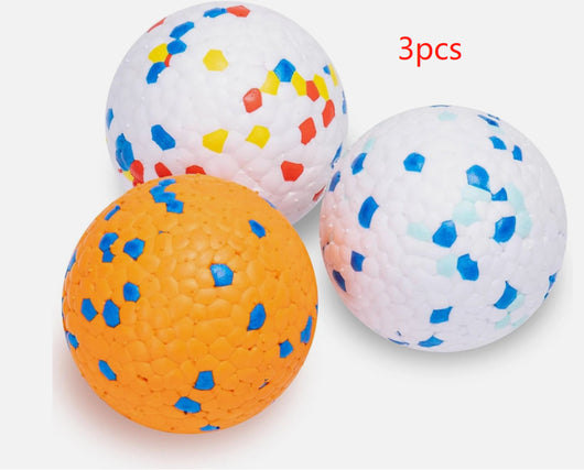 White pet ball dog toy with a textured surface, featuring scattered red, blue, and yellow hexagonal shapes. - Image 20