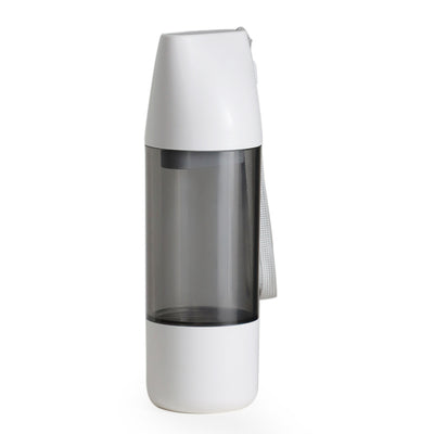 White and translucent gray portable pet water bottle with integrated food container and carrying strap. - Image 12