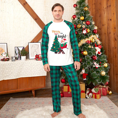 Men's Christmas pajama set with a white top featuring a Santa and Christmas tree graphic, and green plaid pants. - Image 5
