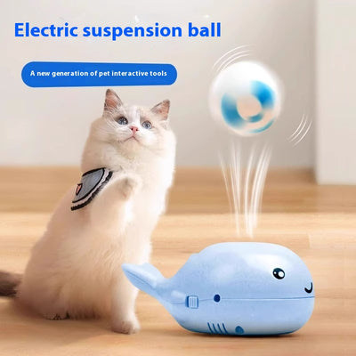 Pink whale-shaped electric fan suspension blower cat toy with two floating balls, powered by USB.